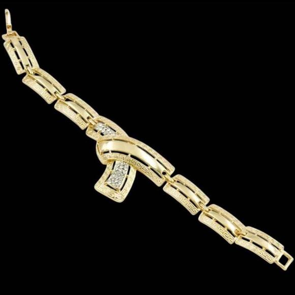 Gold Tone and Clear Stones Necklace, Bracelet, Earrings, and Adjustable Ring Set - Picture 4 of 9